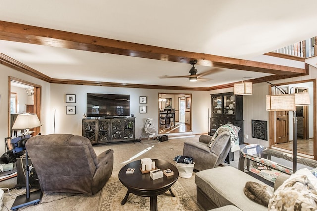 5267 Lickton Pike, Goodlettsville, TN 37072 - living room featuring carpet, beam ceiling, ornamental molding, and a ceiling fan