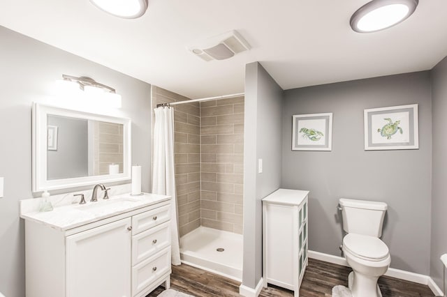 5267 Lickton Pike, Goodlettsville, TN 37072 - full bath with a shower stall, toilet, and wood finished floors