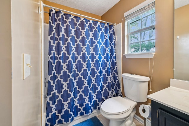 full bath with toilet, a textured ceiling, vanity, and curtained shower