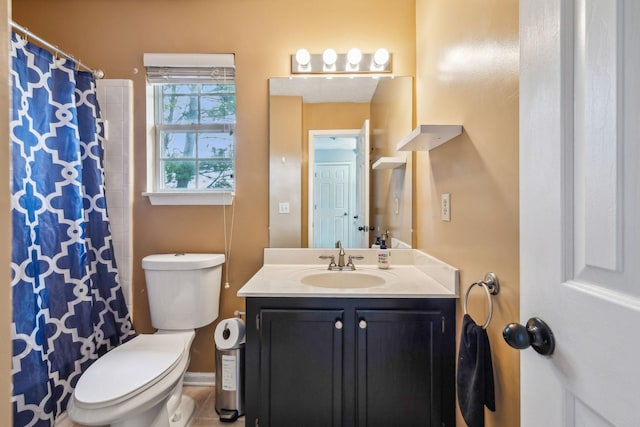 full bathroom with toilet, vanity, baseboards, and a shower with curtain
