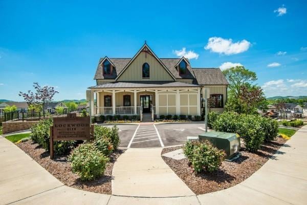 249 Moray Ct, Franklin, TN 37064 - exterior space with board and batten siding and a porch