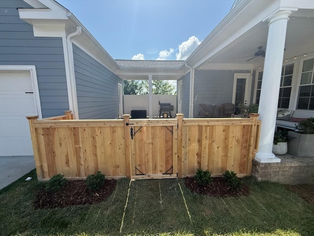 249 Moray Ct, Franklin, TN 37064 - view of patio featuring ceiling fan and a garage