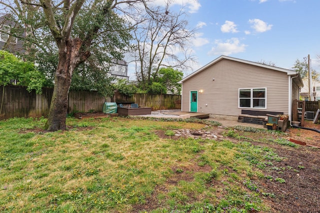 view of yard with a fenced backyard and a patio area