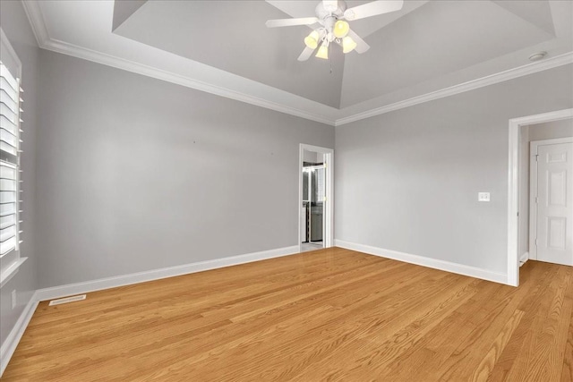 106 Irving Hills Ct, Lascassas, TN 37085 - spare room with a tray ceiling, a ceiling fan, baseboards, visible vents, and light wood-style floors
