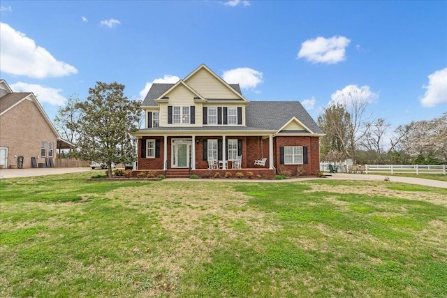 106 Irving Hills Ct, Lascassas, TN 37085 - view of front of house featuring brick siding, fence, a front lawn, and a porch