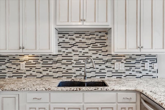 106 Irving Hills Ct, Lascassas, TN 37085 - kitchen with white cabinetry, tasteful backsplash, and a sink