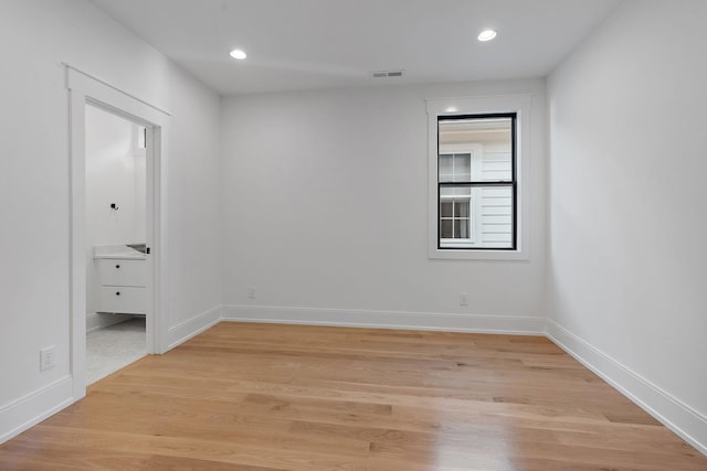 843B Dewees Ave, Nashville, TN 37204 - empty room with light wood-style flooring, visible vents, baseboards, and recessed lighting