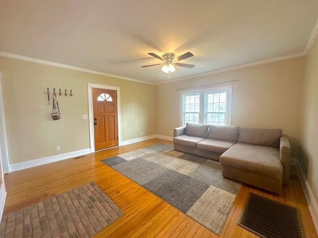 522 Norris Hancock, Big Rock, TN 37023 - living room with light wood-style floors, crown molding, a ceiling fan, and baseboards