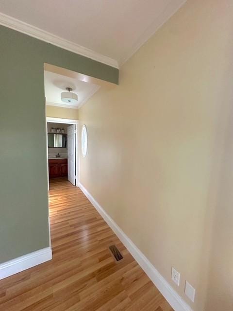 522 Norris Hancock, Big Rock, TN 37023 - corridor with light wood-style flooring, crown molding, and baseboards