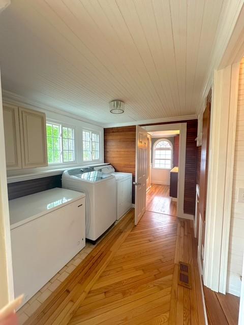 522 Norris Hancock, Big Rock, TN 37023 - laundry area with independent washer and dryer, laundry area, light wood finished floors, and visible vents