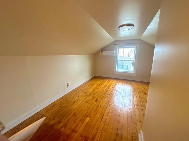 522 Norris Hancock, Big Rock, TN 37023 - additional living space with baseboards, hardwood / wood-style flooring, and lofted ceiling