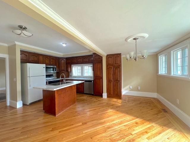 522 Norris Hancock, Big Rock, TN 37023 - kitchen featuring crown molding, light wood finished floors, a notable chandelier, and stainless steel appliances
