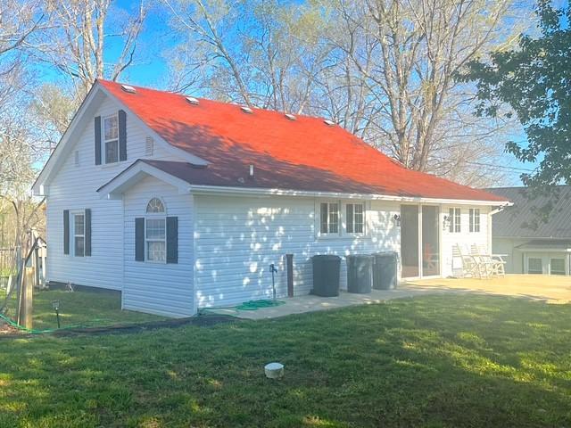 522 Norris Hancock, Big Rock, TN 37023 - back of property with a yard and a patio area