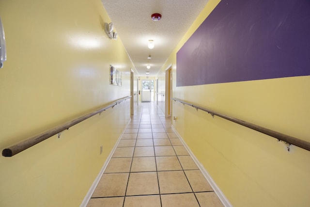 328 Cumberland St W, Cowan, TN 37318 - hall featuring light tile patterned floors and a textured ceiling