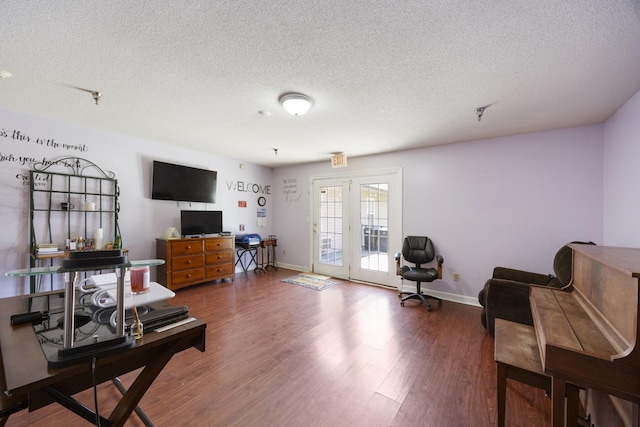 328 Cumberland St W, Cowan, TN 37318 - living area featuring a textured ceiling, wood finished floors, and french doors