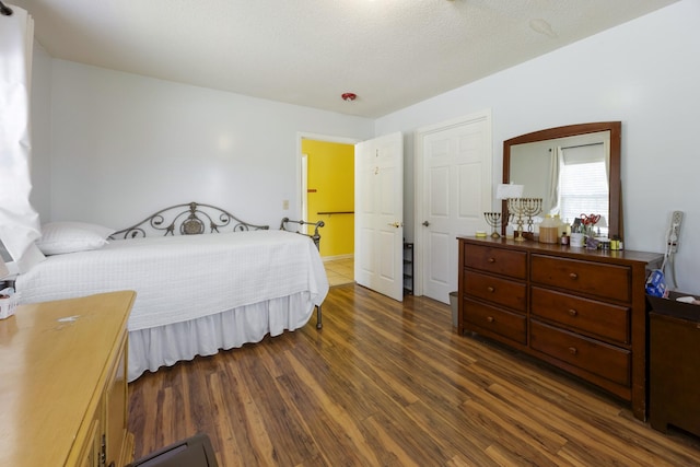 328 Cumberland St W, Cowan, TN 37318 - bedroom with dark wood-style flooring