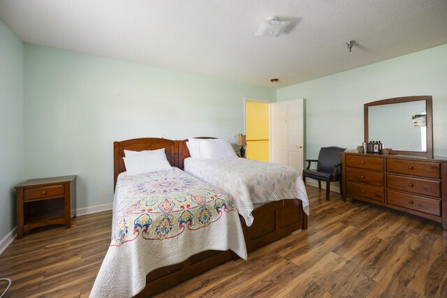 328 Cumberland St W, Cowan, TN 37318 - bedroom with wood finished floors and baseboards
