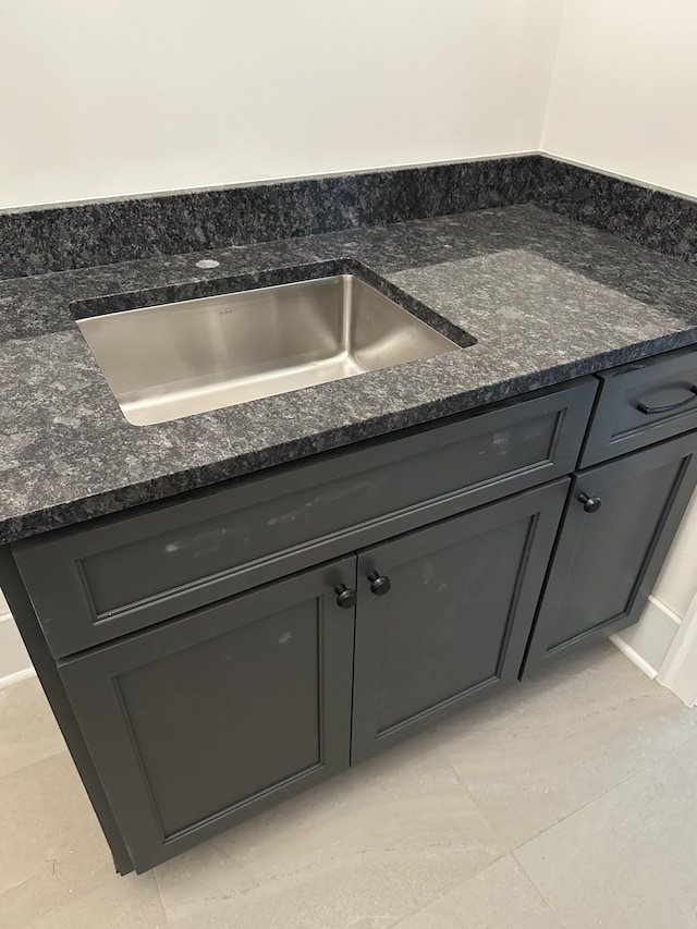 4613 Pat Nixon Ct, Murfreesboro, TN 37130 - detailed view of dark stone counters and gray cabinets