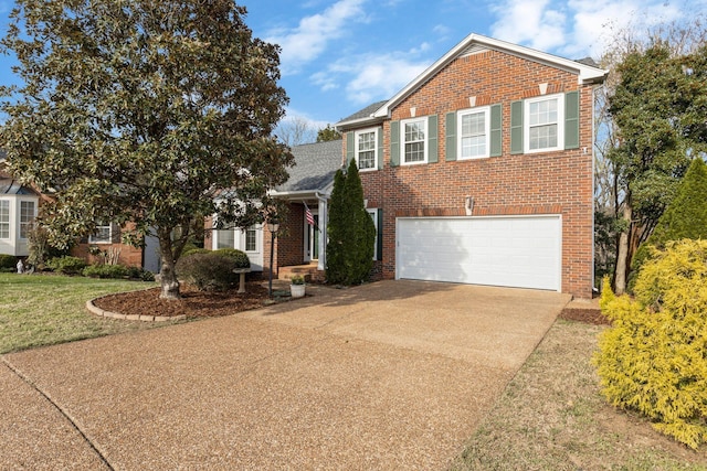 traditional-style home with an attached garage, brick siding, a front lawn, and driveway