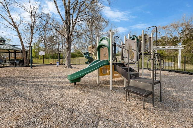 community jungle gym with fence