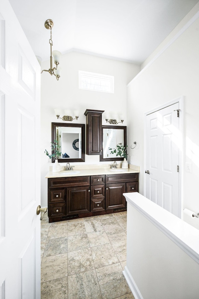 full bath with double vanity and a sink