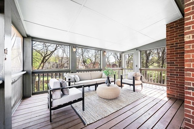 sunroom / solarium with an outdoor living space