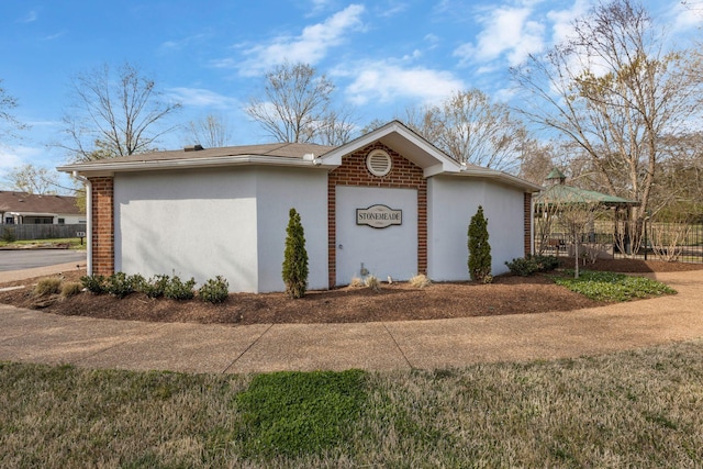 view of front of house featuring stucco siding