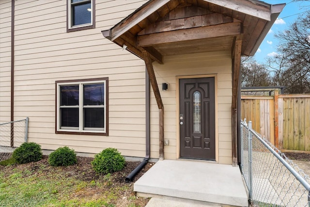 property entrance with fence