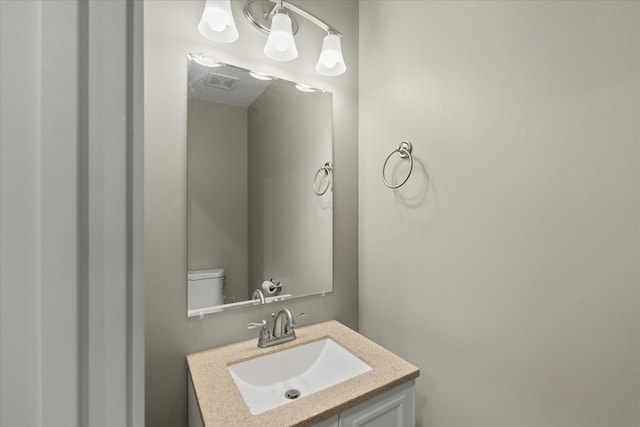 bathroom featuring visible vents and vanity