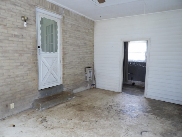 view of exterior entry with heating unit