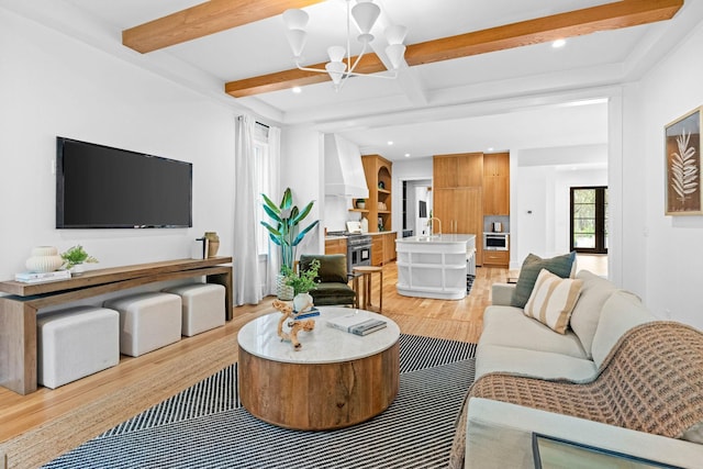 3411 Richards St, Nashville, TN 37215 - living area with light wood finished floors, an inviting chandelier, recessed lighting, and beam ceiling