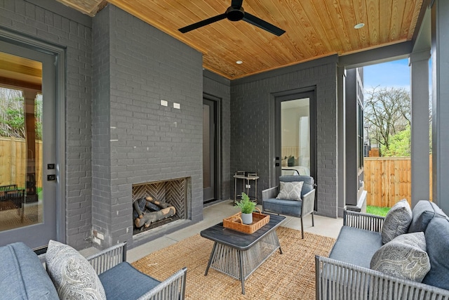 3411 Richards St, Nashville, TN 37215 - view of patio / terrace featuring a ceiling fan, an outdoor living space with a fireplace, and fence