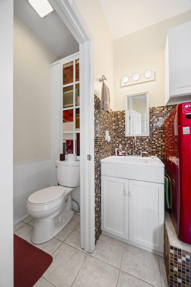 300 Iron Gap Rd, Belvidere, TN 37306 - half bath featuring wainscoting, tile patterned floors, and vanity