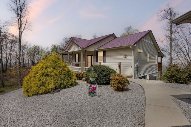 300 Iron Gap Rd, Belvidere, TN 37306 - view of front of home featuring covered porch and a metal roof