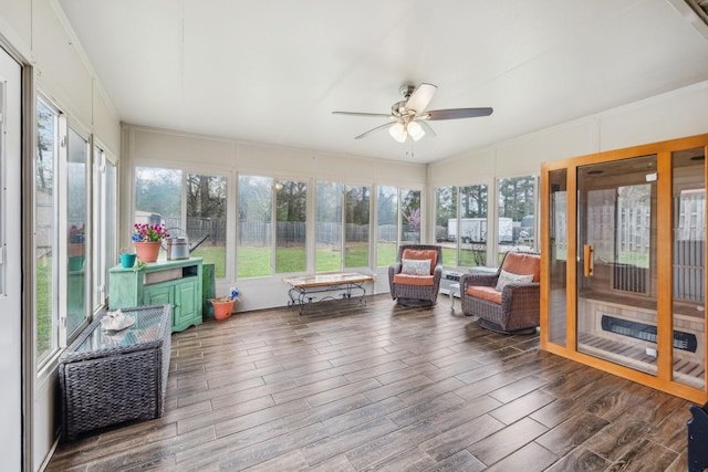 sunroom featuring wood finished floors