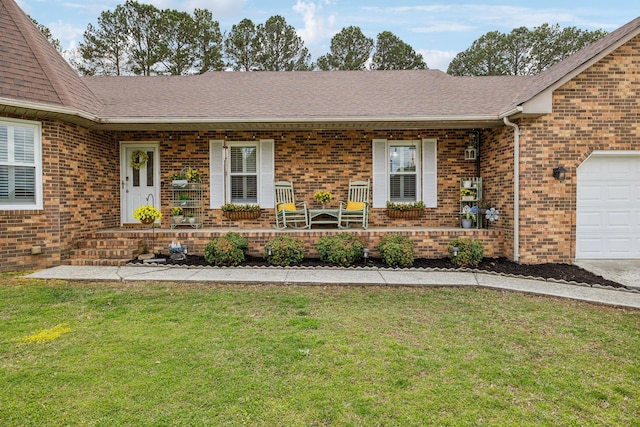 exterior space with a lawn, a porch, and roof with shingles