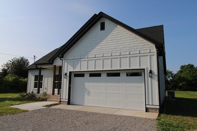 2111 Horton Way, Lewisburg, TN 37091 - view of front of property with board and batten siding, a garage, and gravel driveway