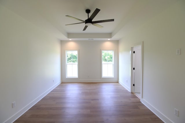 2111 Horton Way, Lewisburg, TN 37091 - unfurnished room featuring a ceiling fan, wood finished floors, baseboards, and a raised ceiling