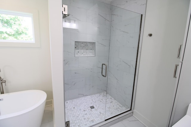 2111 Horton Way, Lewisburg, TN 37091 - full bath featuring marble look tiles, a marble finish shower, a freestanding tub, and baseboards