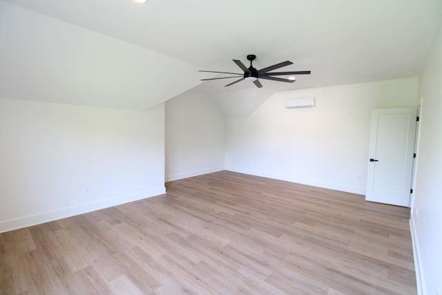 2111 Horton Way, Lewisburg, TN 37091 - additional living space featuring ceiling fan, lofted ceiling, baseboards, light wood-style floors, and a wall mounted air conditioner