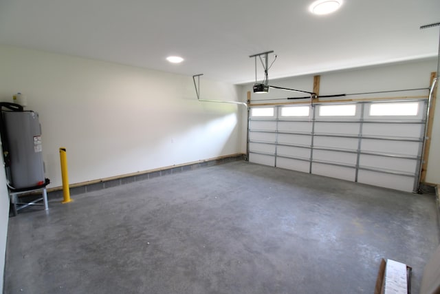 2111 Horton Way, Lewisburg, TN 37091 - garage featuring water heater and a garage door opener