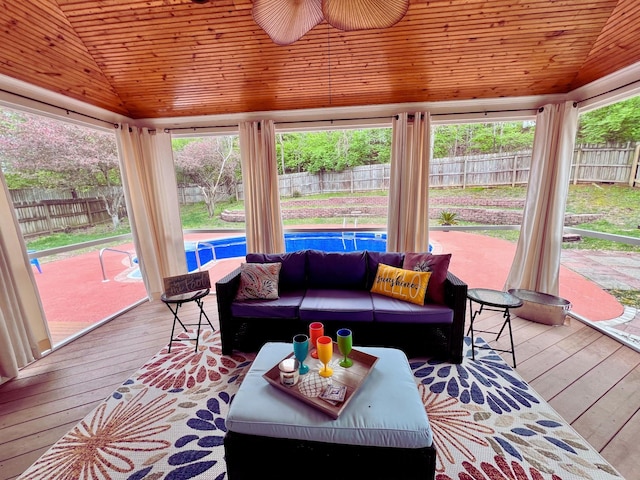 living room with lofted ceiling, wood ceiling, and hardwood / wood-style flooring