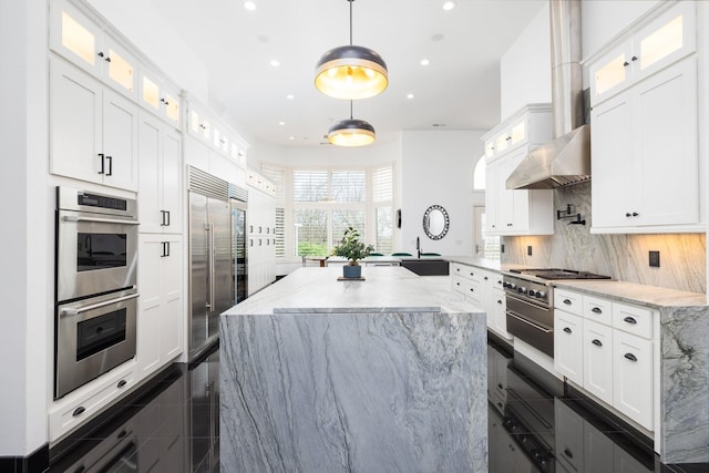 720 Valhalla Ln, Brentwood, TN 37027 - kitchen with a center island, recessed lighting, white cabinets, and stainless steel appliances