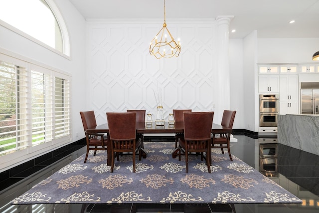 720 Valhalla Ln, Brentwood, TN 37027 - dining space featuring an accent wall, recessed lighting, an inviting chandelier, and a wealth of natural light