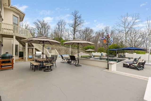 720 Valhalla Ln, Brentwood, TN 37027 - view of patio / terrace with a fenced backyard, grilling area, stairs, outdoor dining space, and a fenced in pool