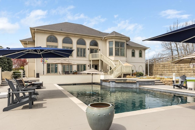 720 Valhalla Ln, Brentwood, TN 37027 - view of swimming pool featuring a patio area, a pool with connected hot tub, fence, and stairs