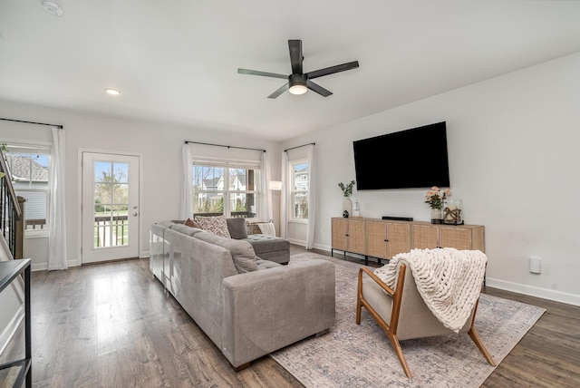 living room with wood finished floors, baseboards, a ceiling fan, and recessed lighting