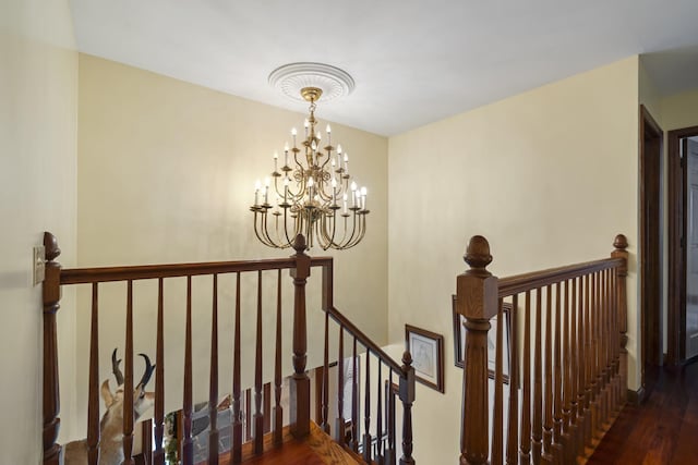 1737 Bratton Ln, Williamsport, TN 38487 - stairway with a notable chandelier and wood finished floors