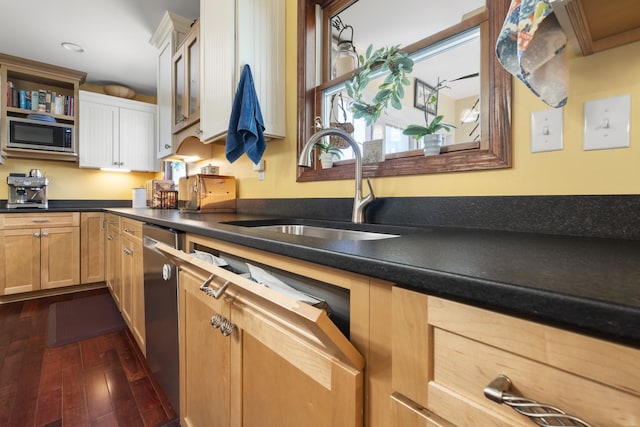 1737 Bratton Ln, Williamsport, TN 38487 - kitchen with dark wood-style floors, a sink, stainless steel appliances, dark countertops, and white cabinets