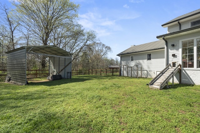 1737 Bratton Ln, Williamsport, TN 38487 - view of yard with fence and a carport